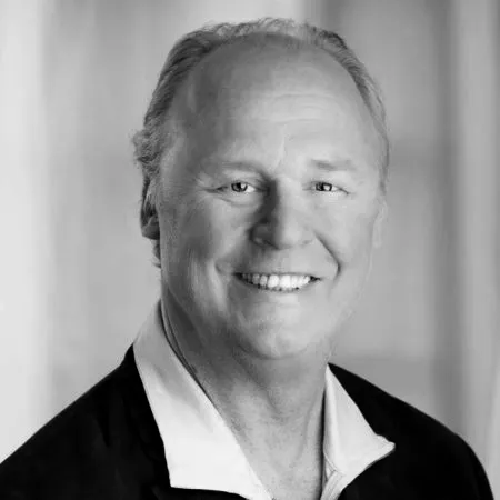Black and white headshot of Jon Carlson, Executive Editor of MPLS PAGE and award-winning Minneapolis-based journalist and filmmaker.